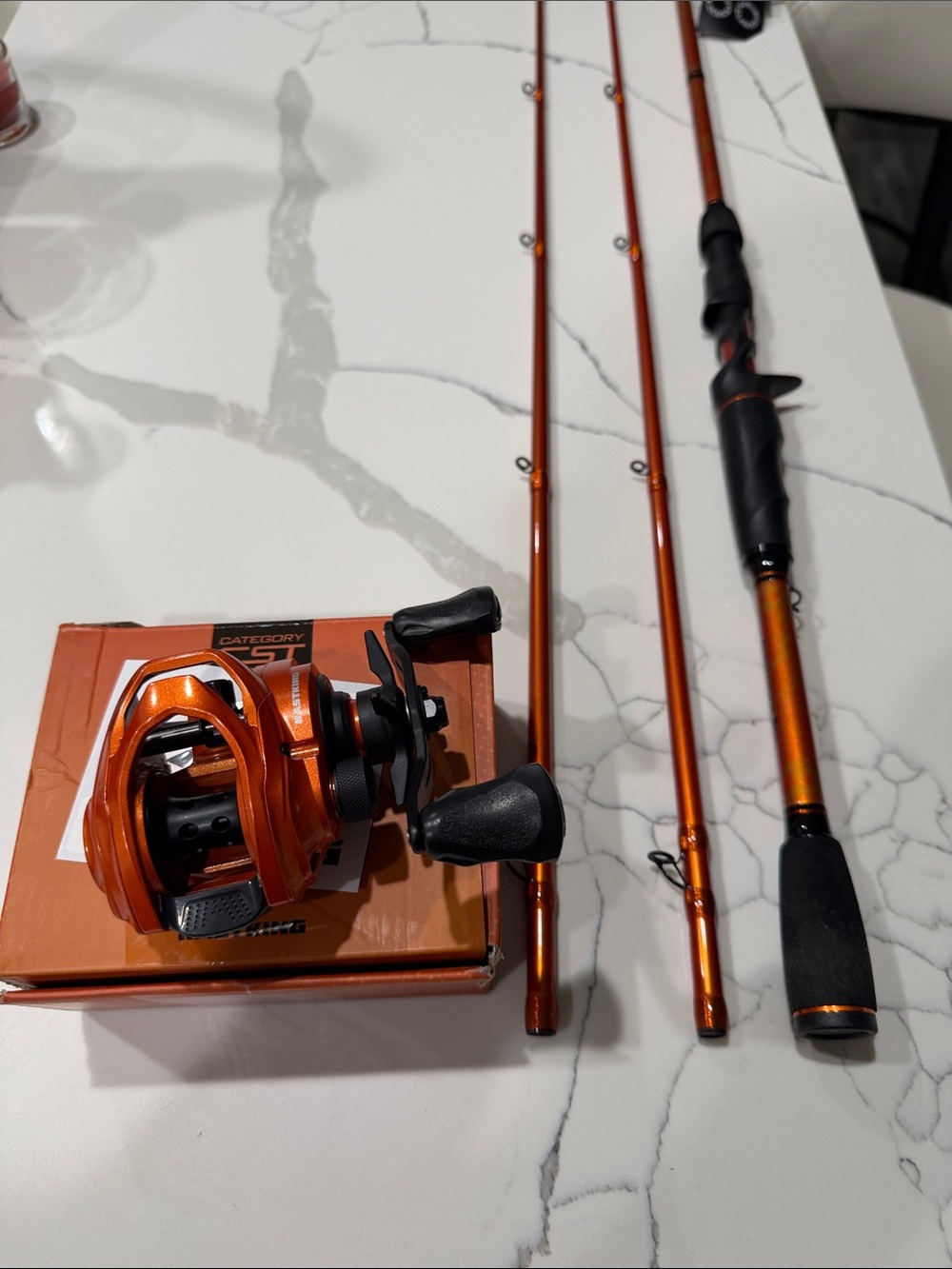 Orange 3-Piece Fishing Rod and Baitcasting Reel Set - Sleek Orange Finish